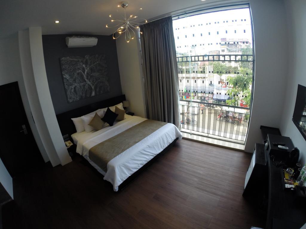 De Art Hotel Phnom-Penh Kamer foto